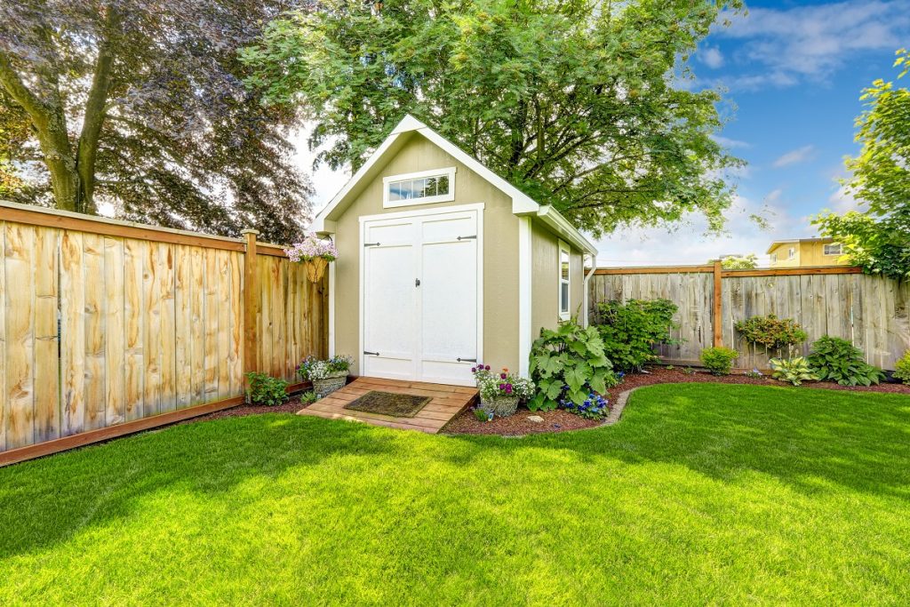 New shed with flowerbed