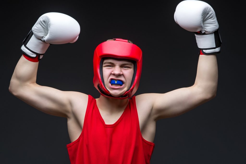 Young boxer celebrating