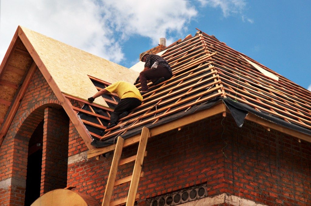 Newly bought roof being installed