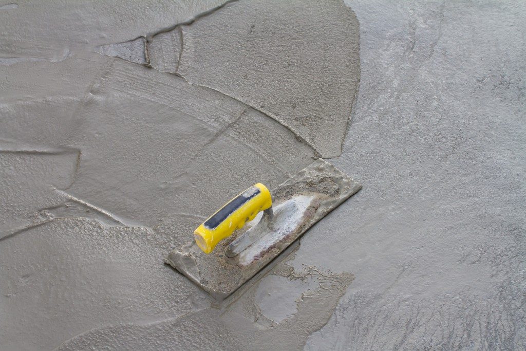 Trowel on a fresh concrete