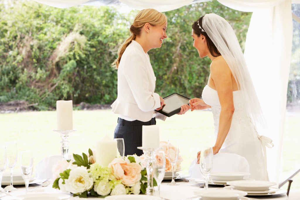 Bride talking to her wedding planner
