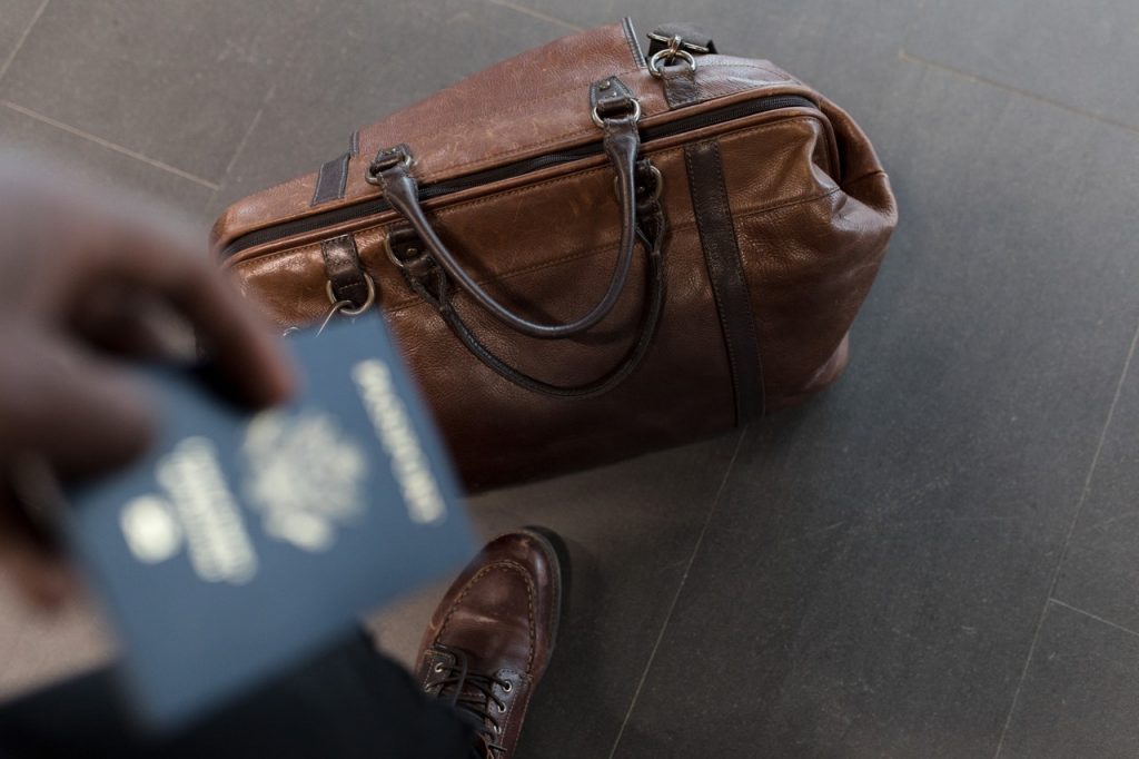 man holding a passport